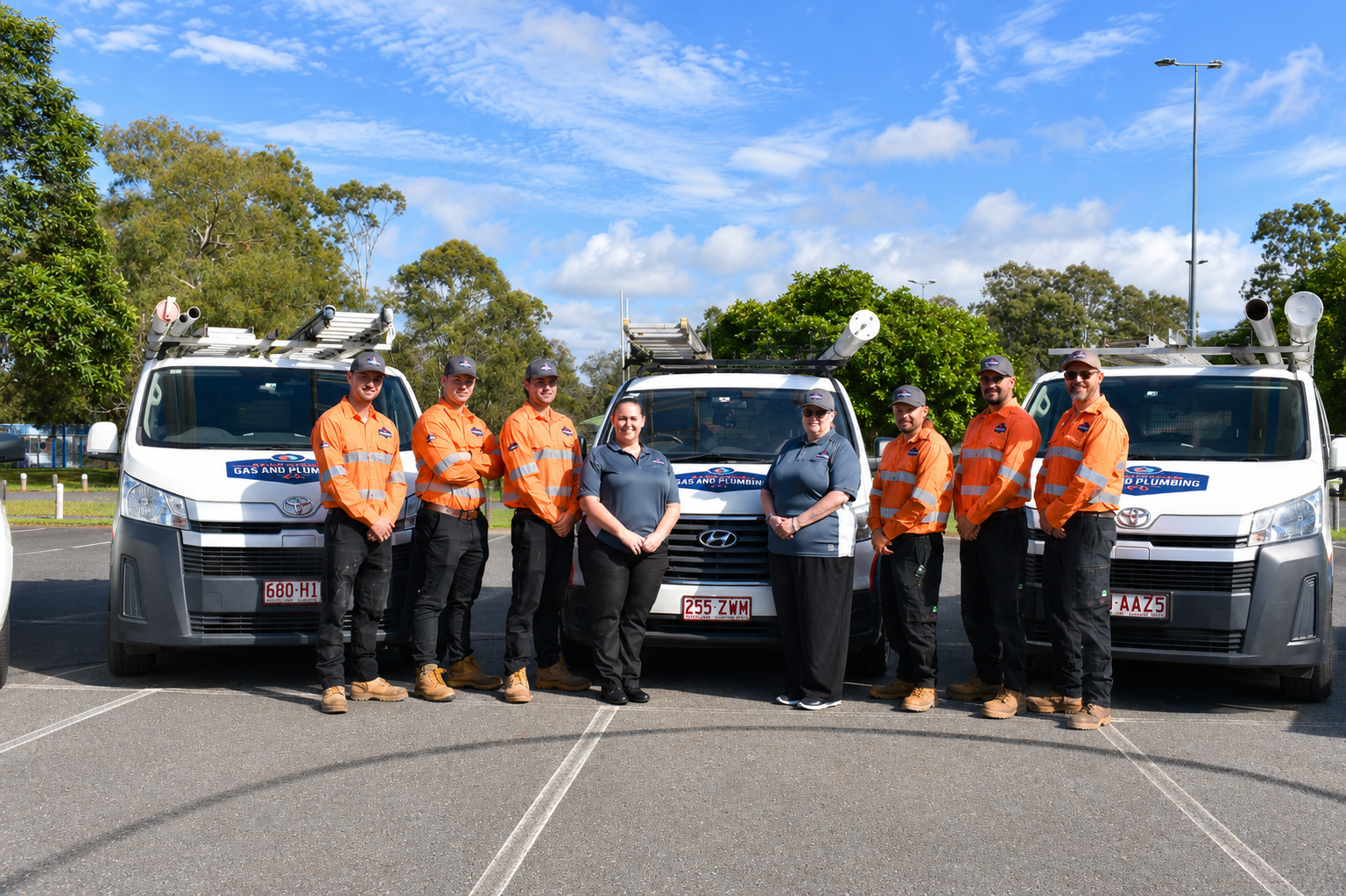 AGPCo Staff in front of Vehicles